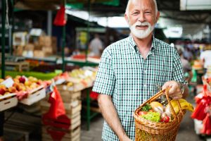 Man with dementia buying groceries