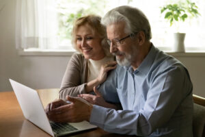 Couple doing research on estate planning firms